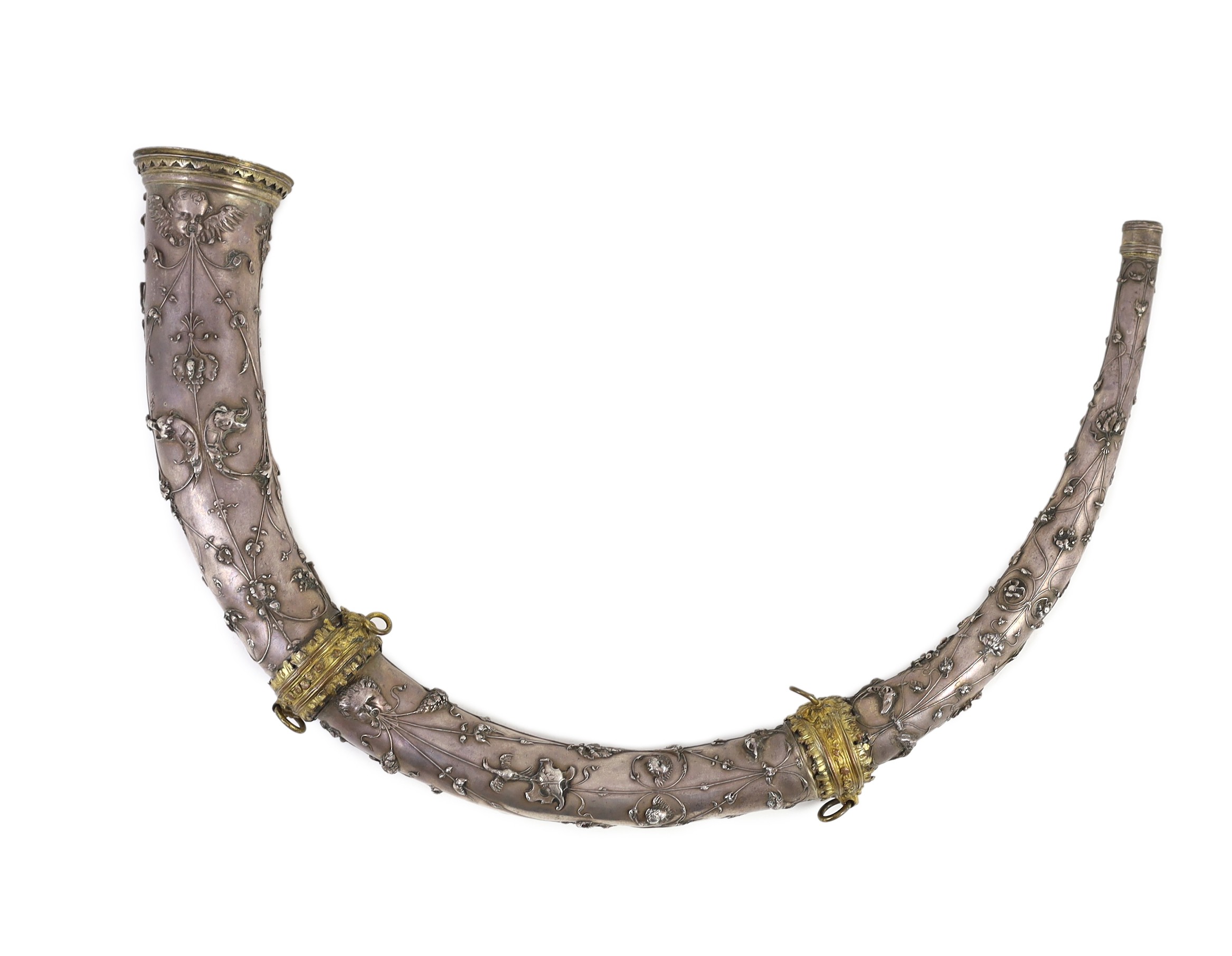 A 19th century Italian white metal hunting horn, length 40cm, depth 26cm